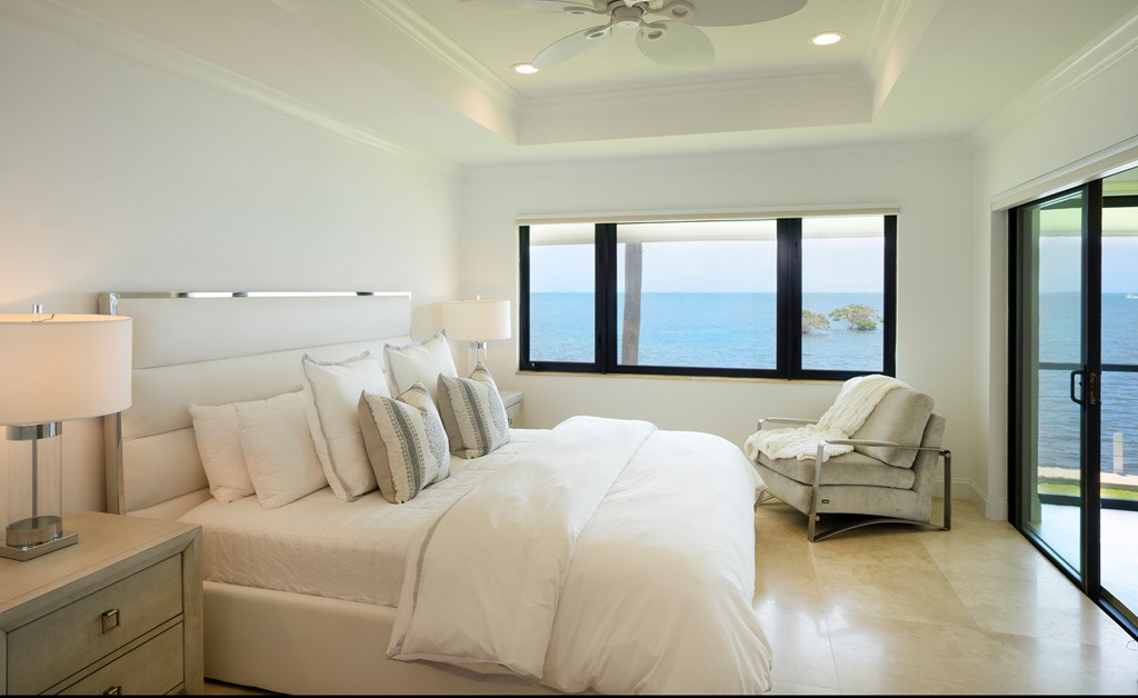 A picture containing indoor, floor, wall, bed
Description automatically generated